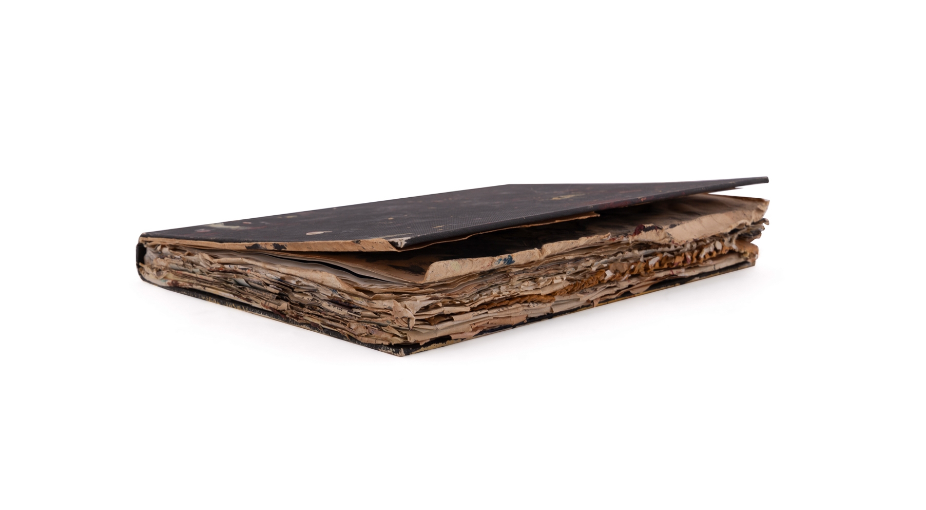 A worn, dark-bound book with visible signs of age and use.