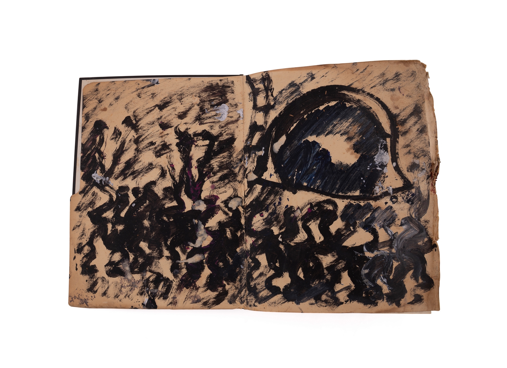 A worn, dark-bound book with visible signs of age and use.