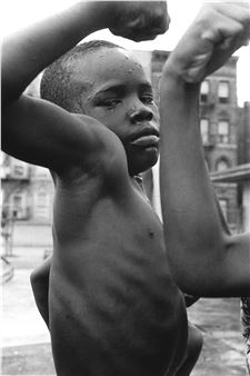 Boy playing 'tough' in the streets of Harlem, New York City 1963 Picture
