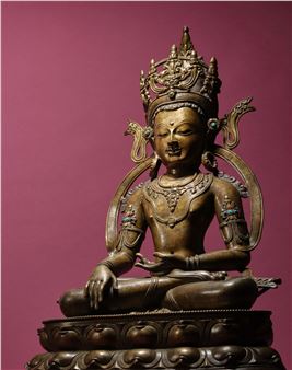 A COPPER INLAID COPPER ALLOY FIGURE OF AKSHOBHYA