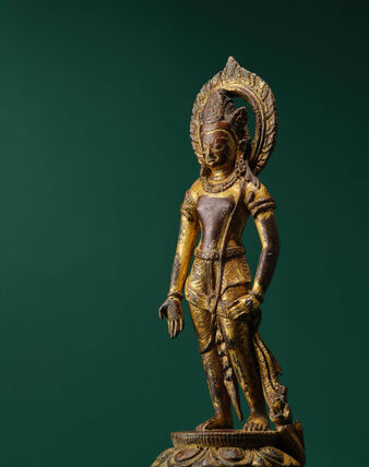A GILT COPPER ALLOY FIGURE OF A BODHISATTVA