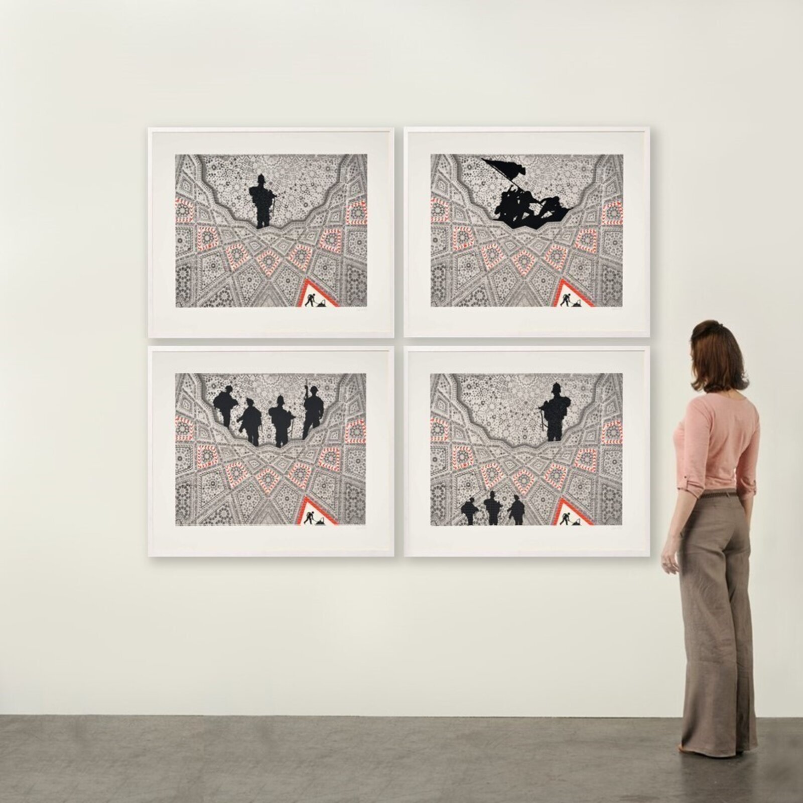 A four-panel artwork featuring black silhouettes of figures against a detailed geometric background.