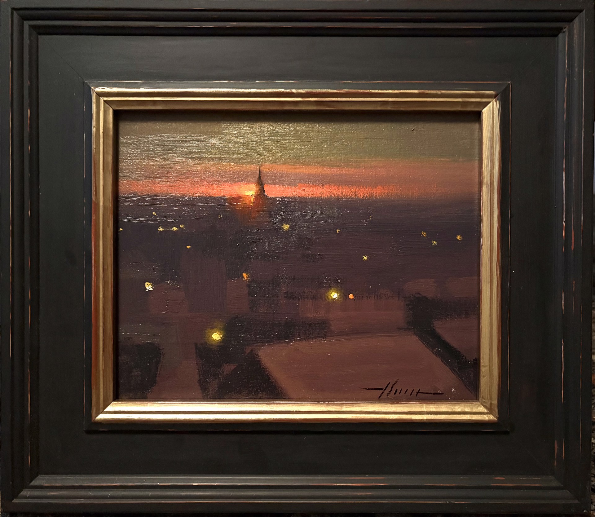 A small oil painting of a twilight cityscape with glowing lights and a distant spire.