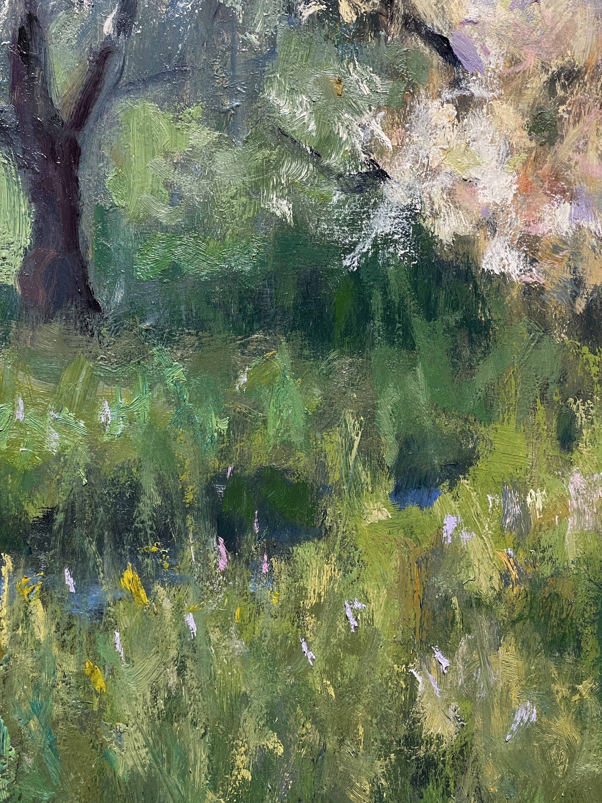 A serene landscape painting of blossoming trees beside a stream.