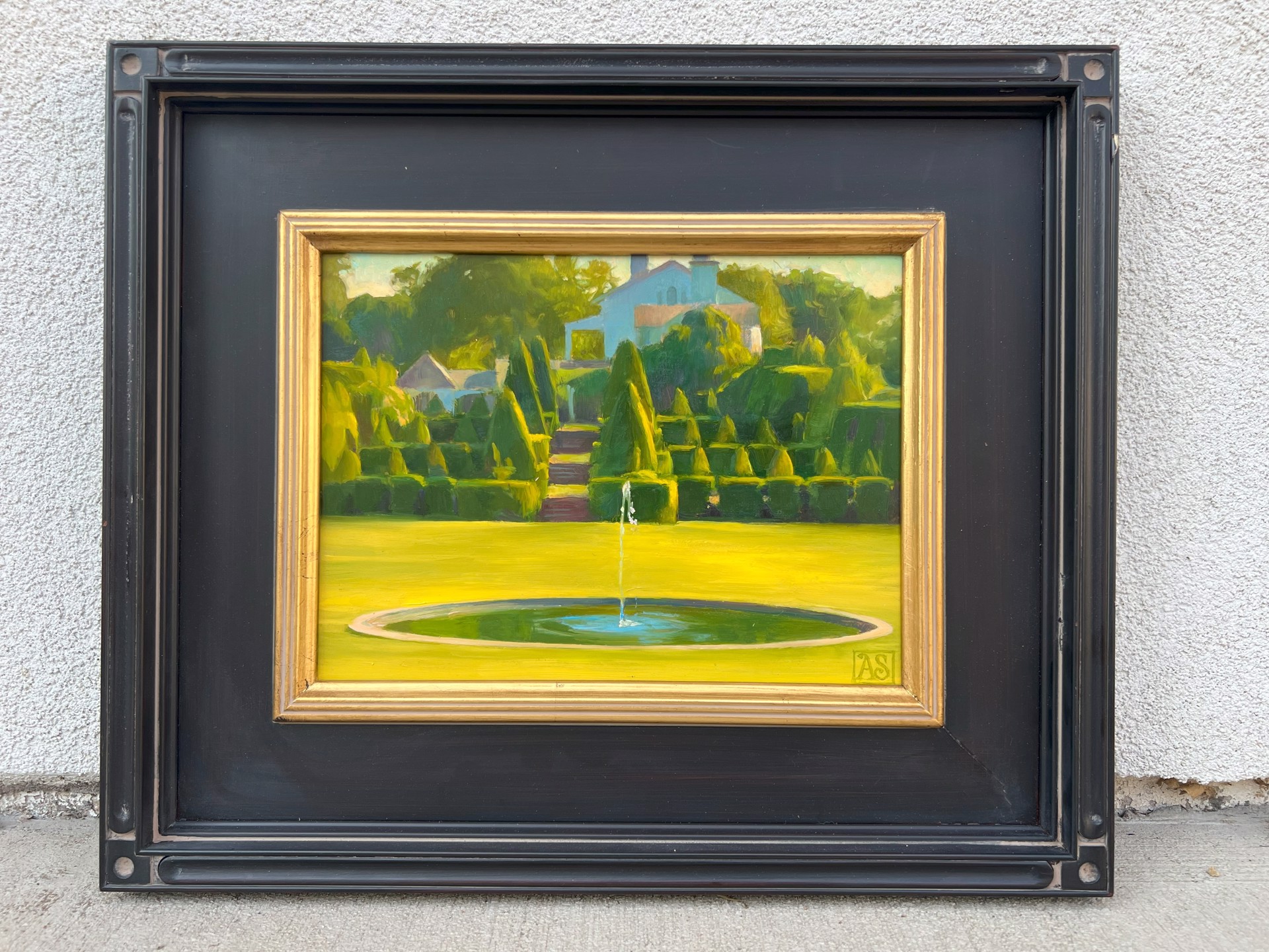 A vibrant garden scene featuring a fountain, manicured hedges, and a distant house.