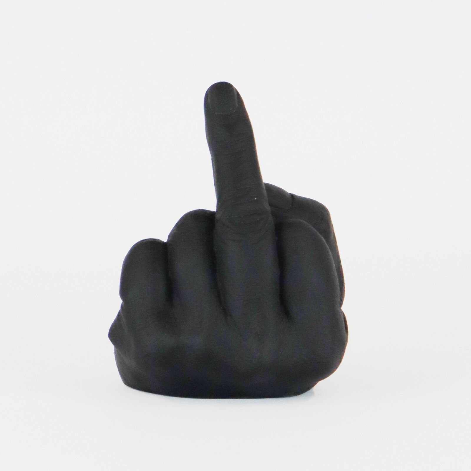 A row of six translucent, colorful hand sculptures in the middle finger gesture.
