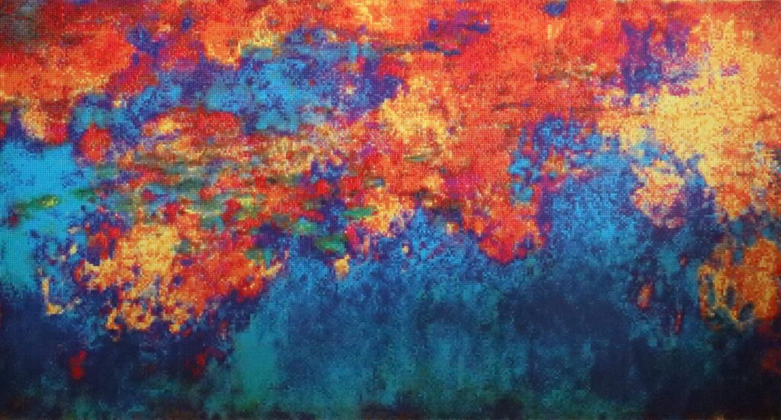 A panoramic abstract landscape blending fiery reds and oranges with deep blues.