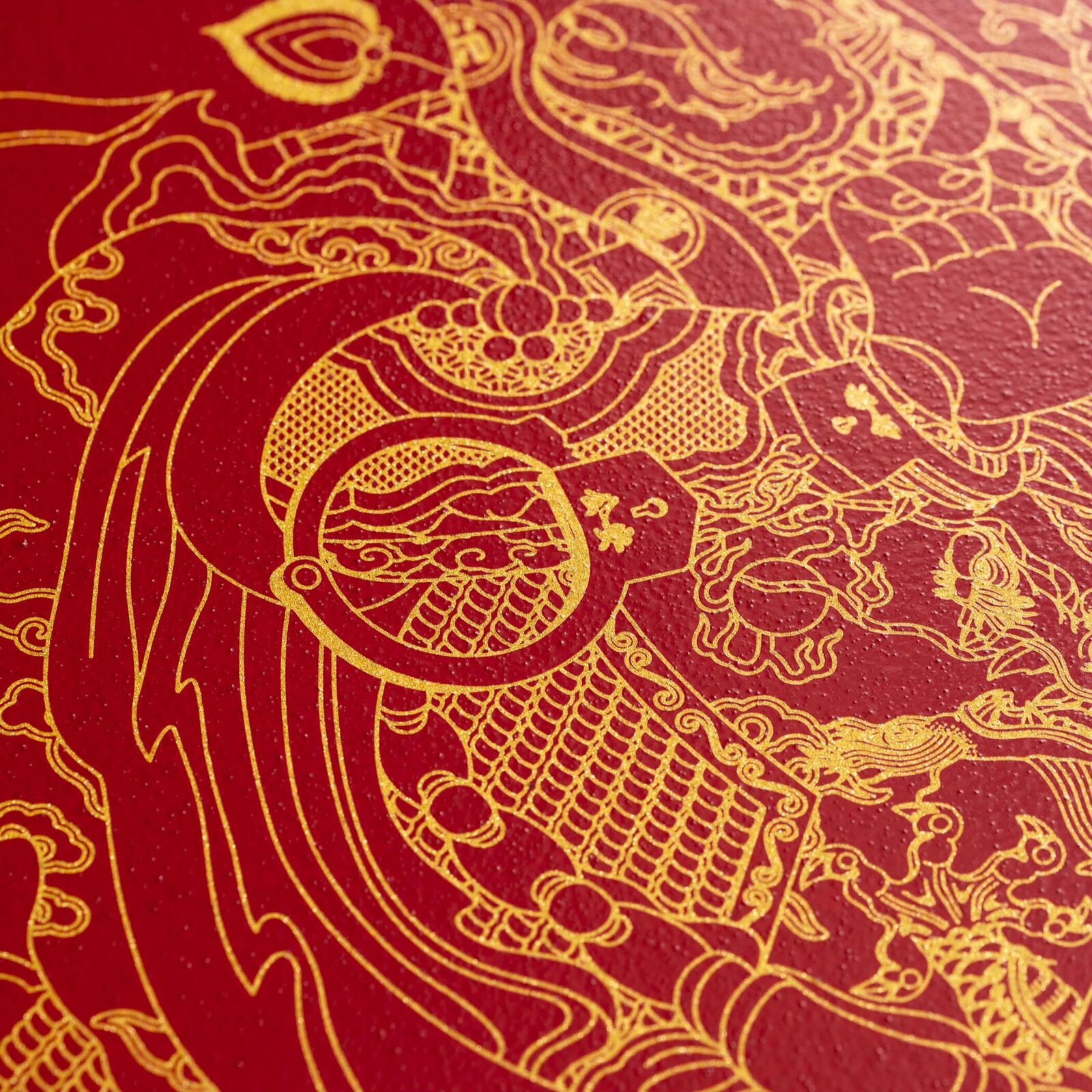 A red and gold illustration of a man with a beard and a long beard.