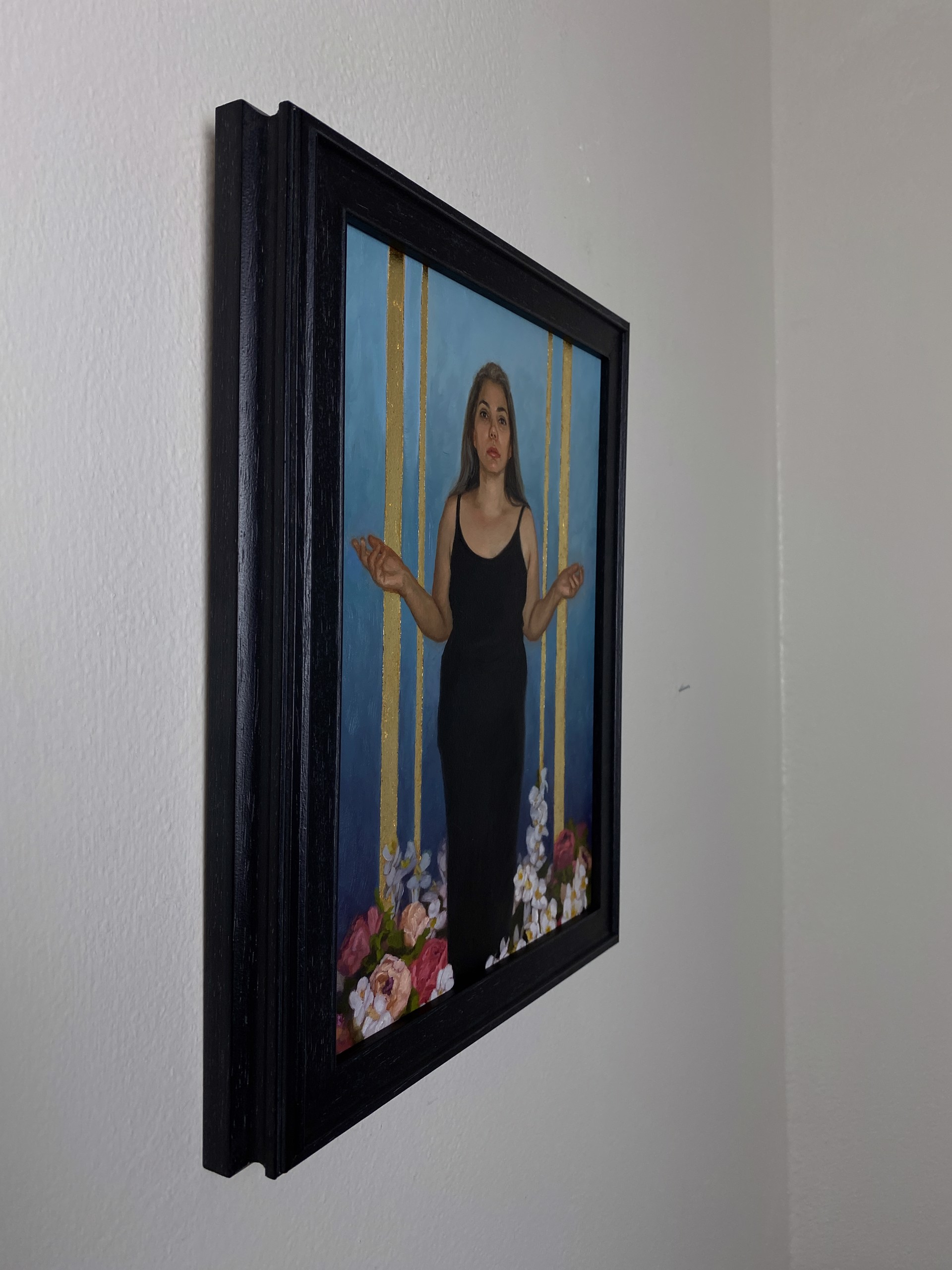A portrait of a figure in a black dress standing amidst flowers against a blue and gold background.