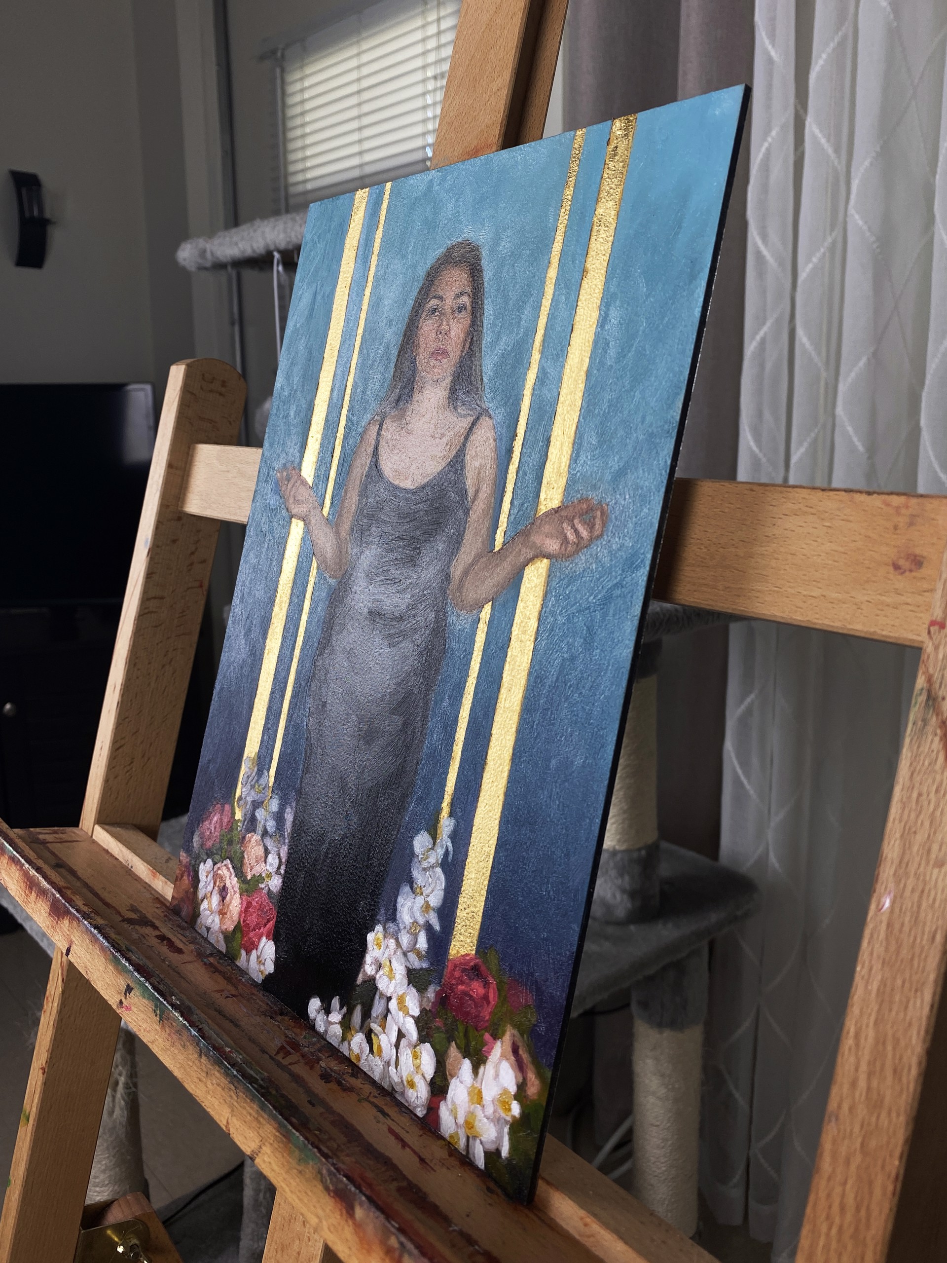 A portrait of a figure in a black dress standing amidst flowers against a blue and gold background.