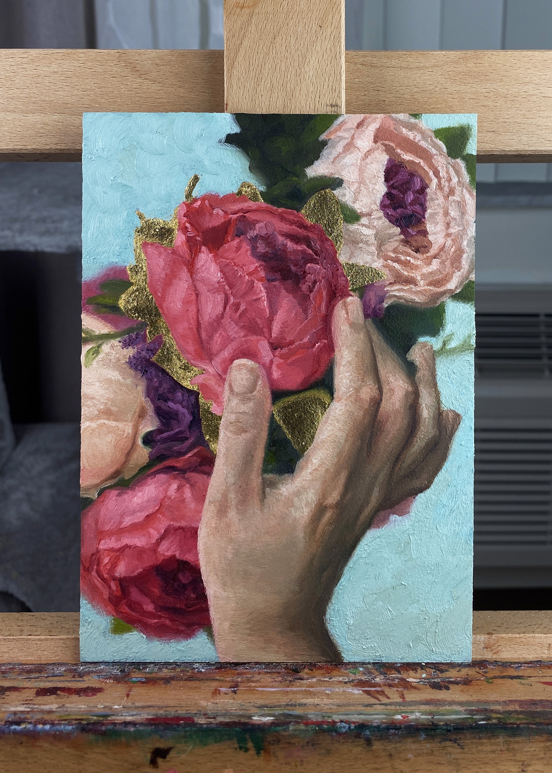 A painting of a person holding a bouquet of flowers.