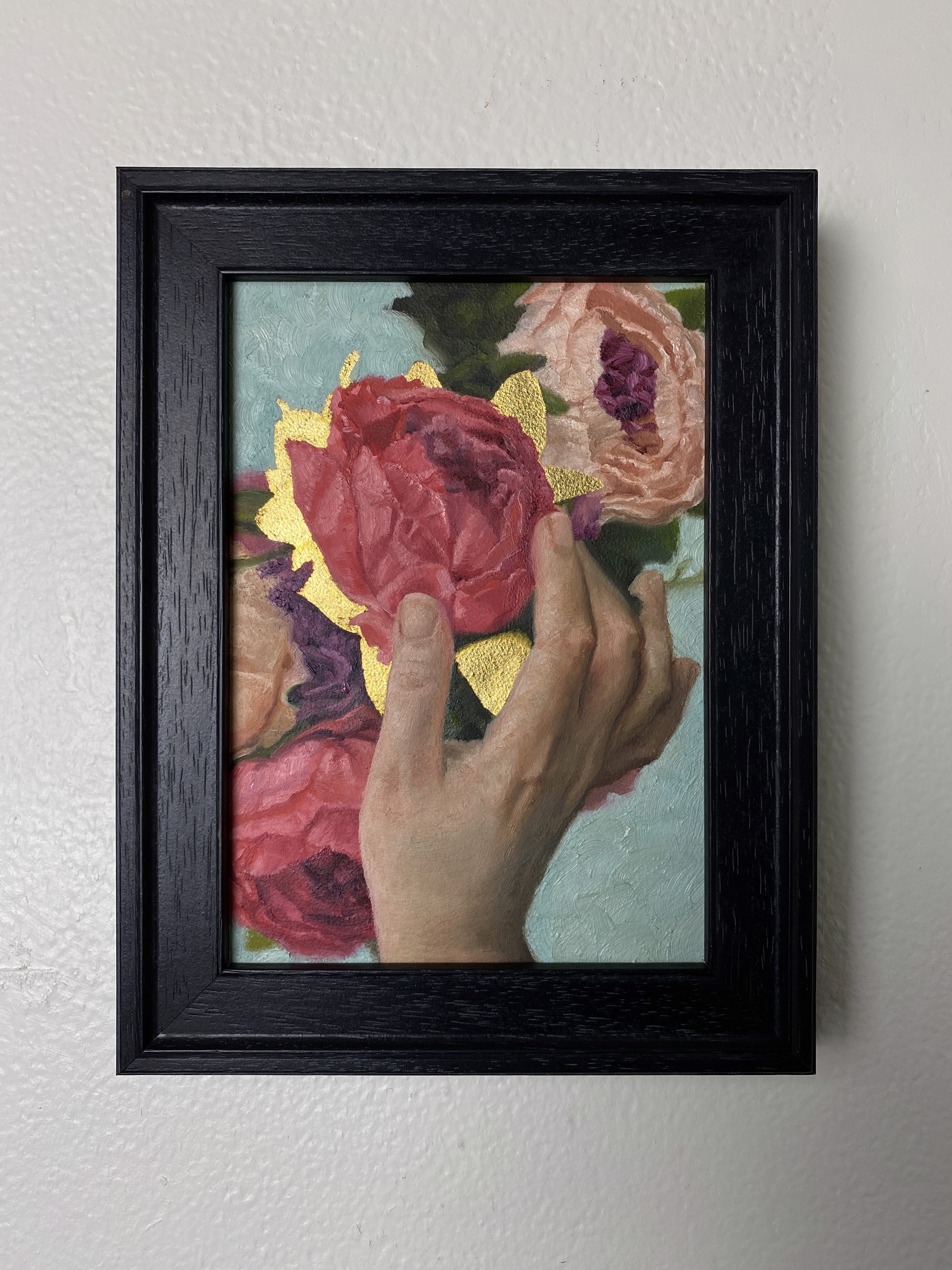 A painting of a person holding a bouquet of flowers.