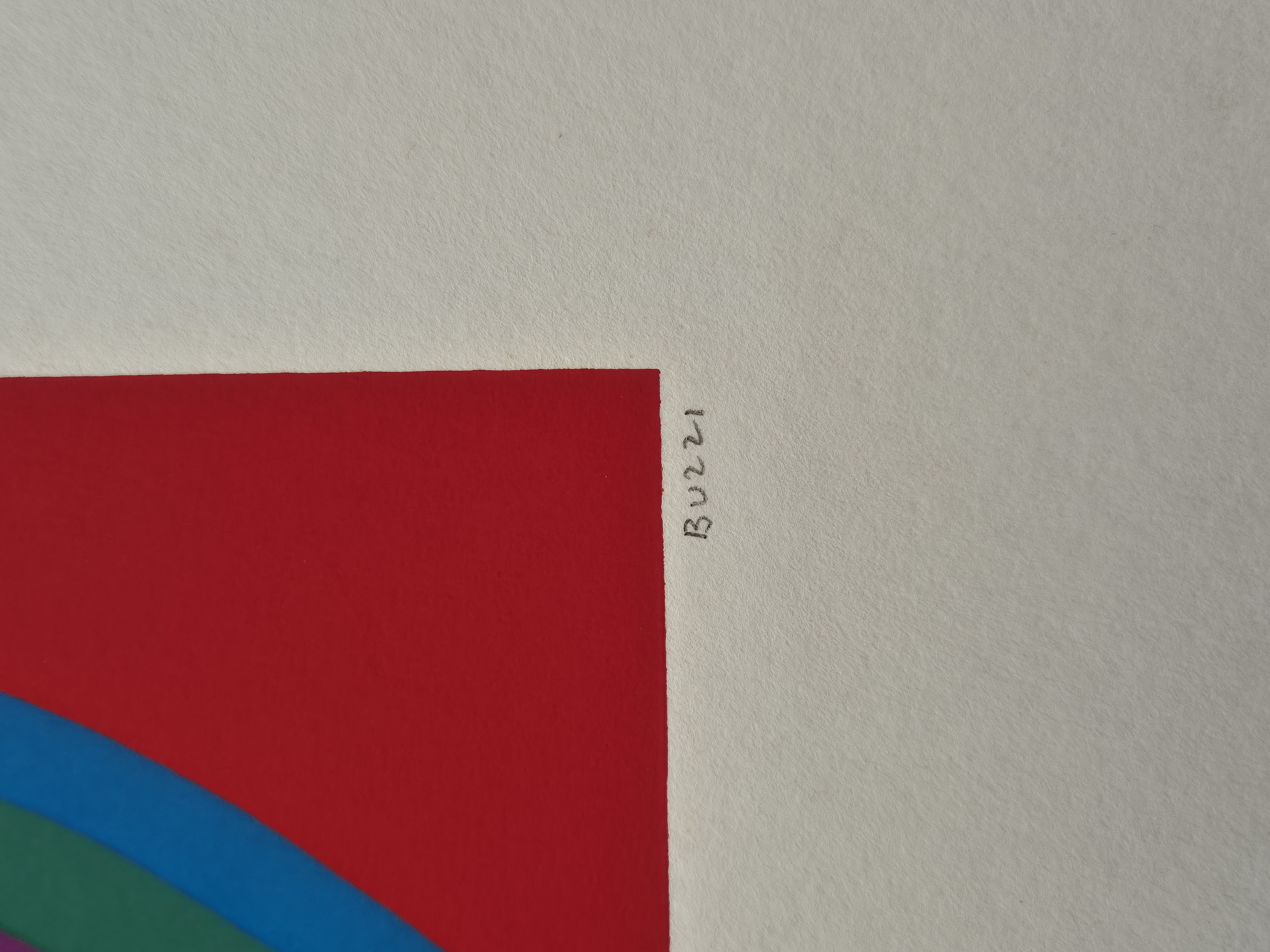 A graphic print featuring a black rectangle with a vibrant, wavy rainbow pattern against a red background.