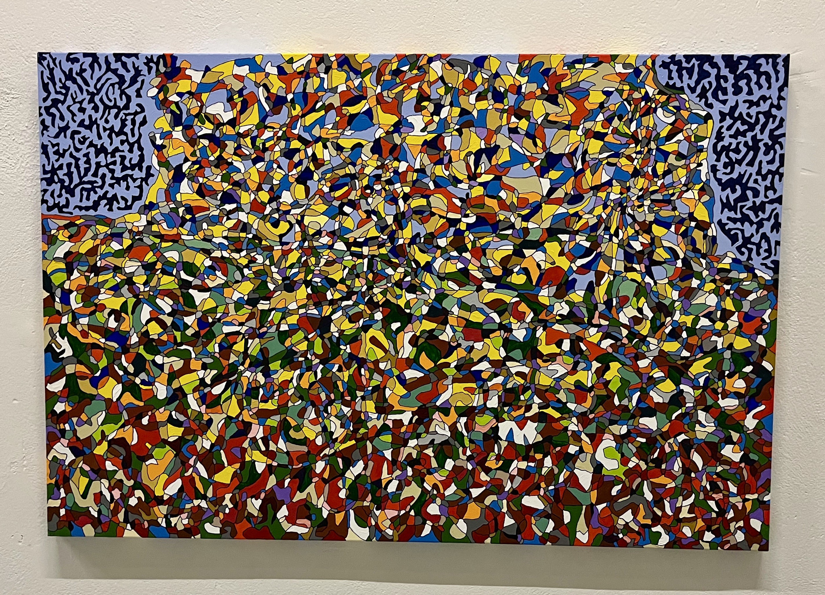 A painting on a wall in a room. 