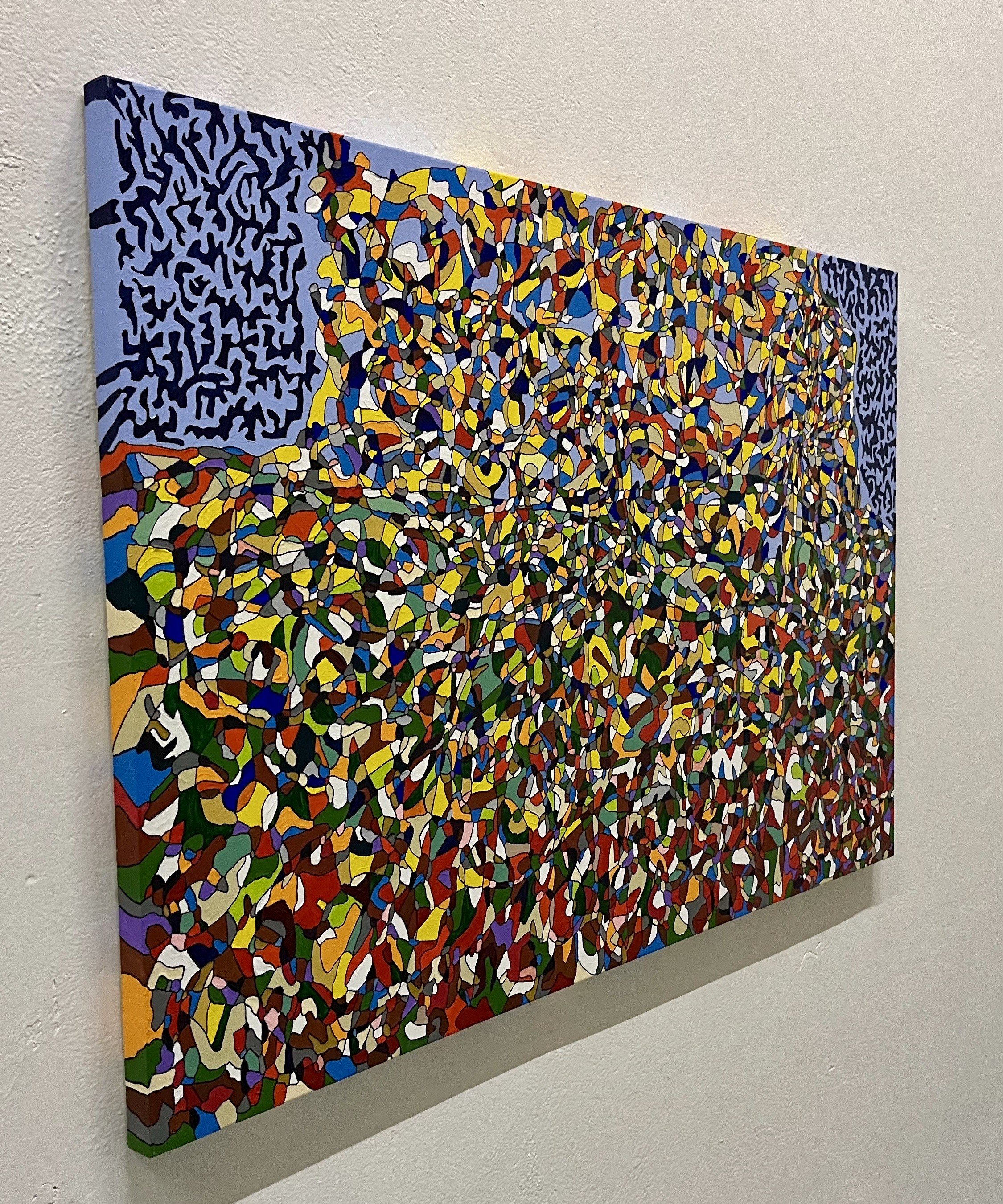 A painting on a wall in a room. 