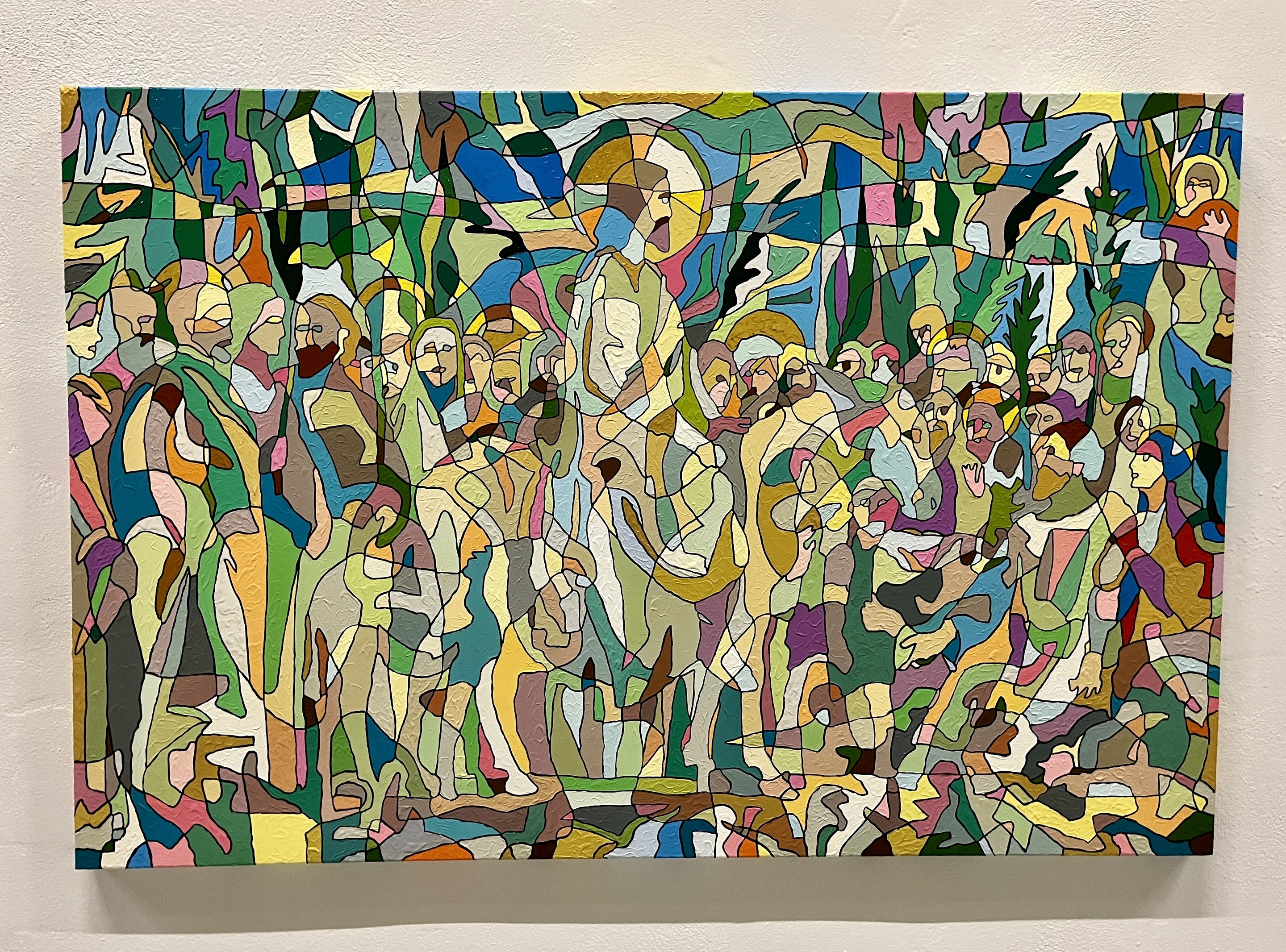 A painting on a wall in a room with a white wall.