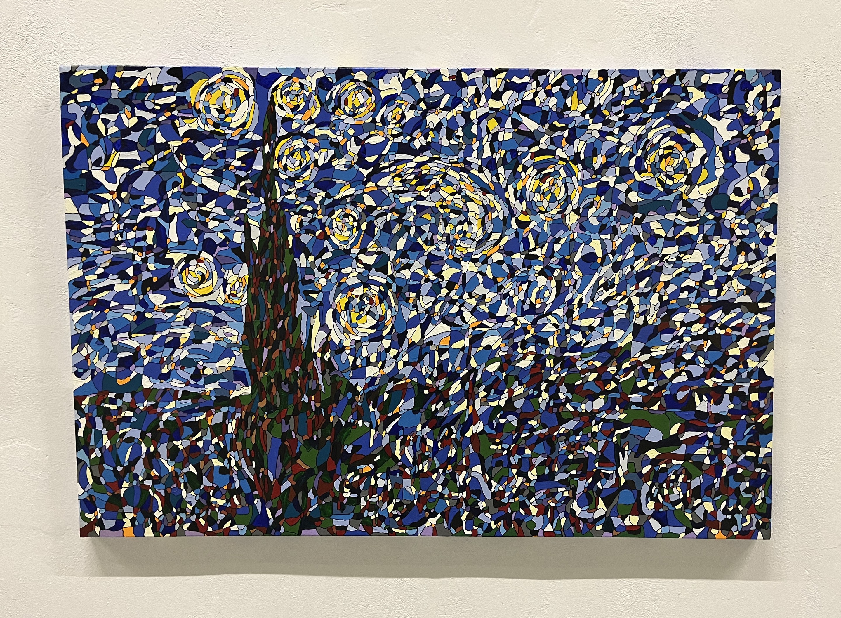 A painting on a wall in a room. 