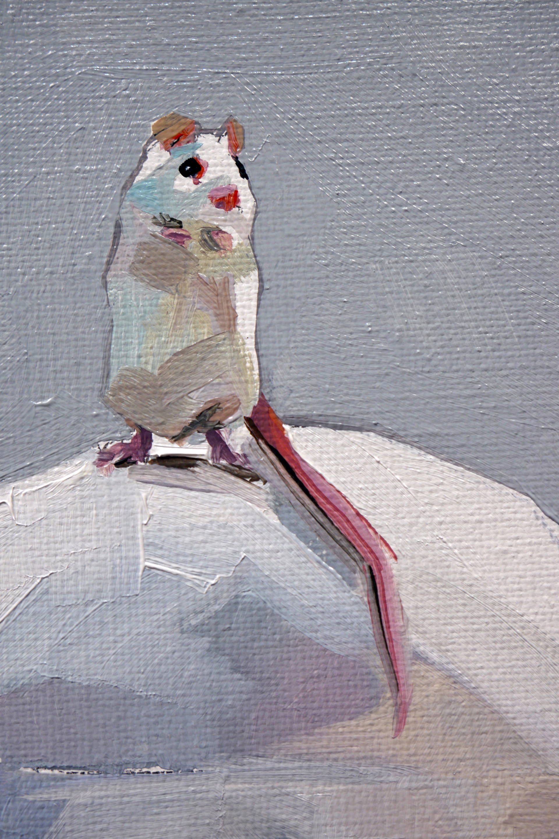 A figure holds a skull with a small rodent perched on top, rendered in a painterly style with warm skin tones against a cool grey background.