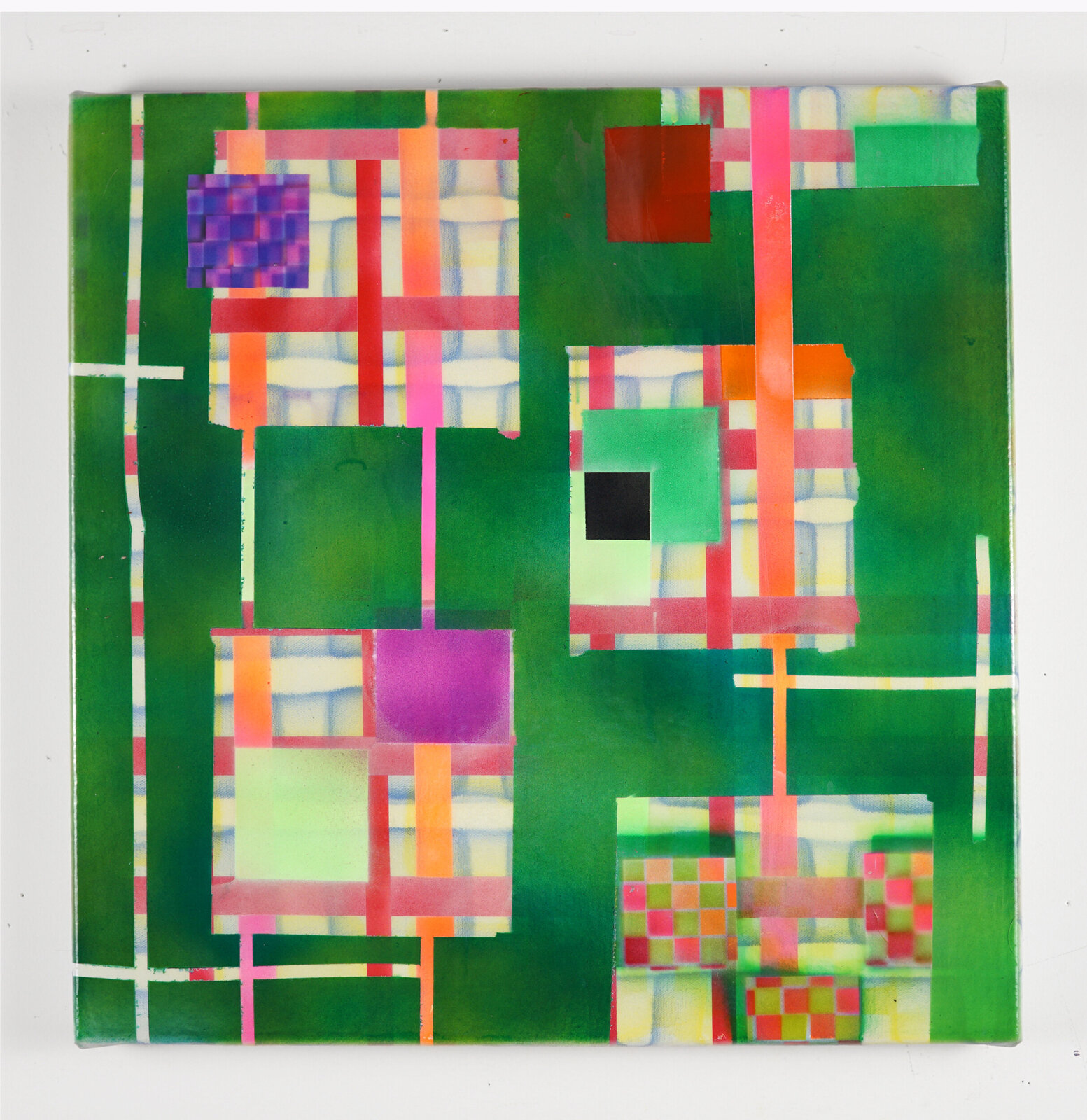 A colorful abstract composition featuring a grid of geometric shapes on a green canvas.