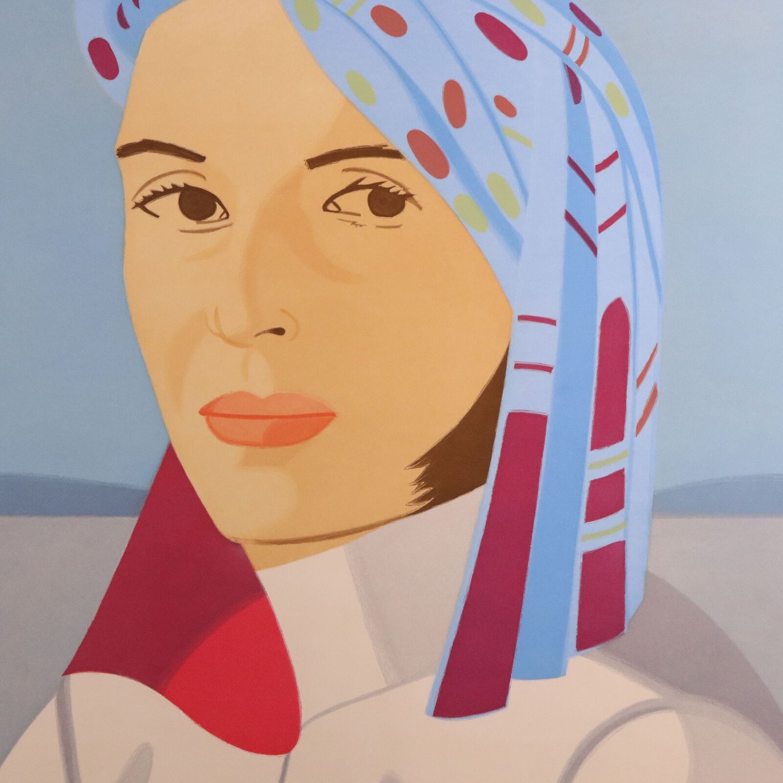 A stylized portrait of a figure with a patterned headscarf against a seascape background.
