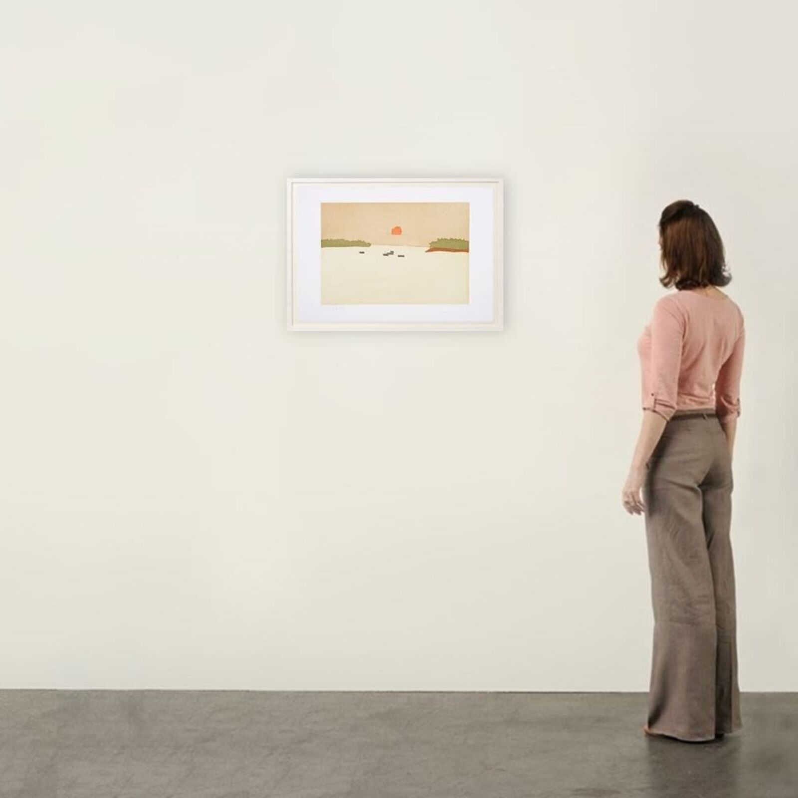 A picture of a painting of a sunset over a body of water.