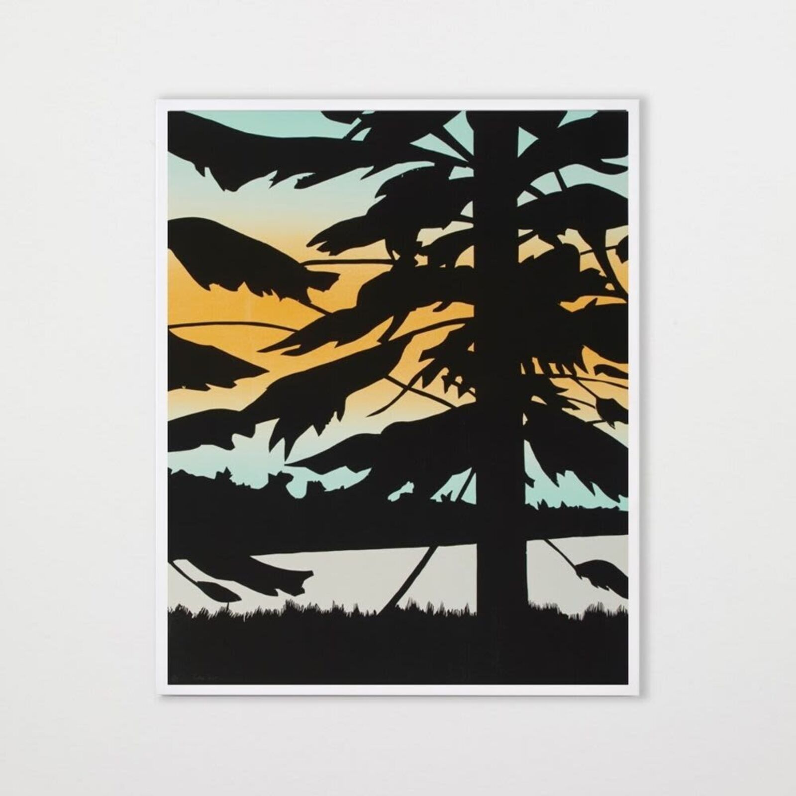 A set of three prints of a sunset with trees in the background.