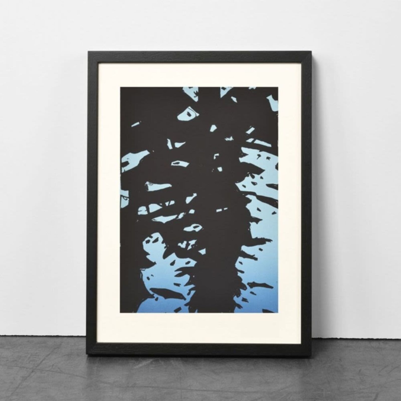 A black and blue painting of a tree on a blue background.