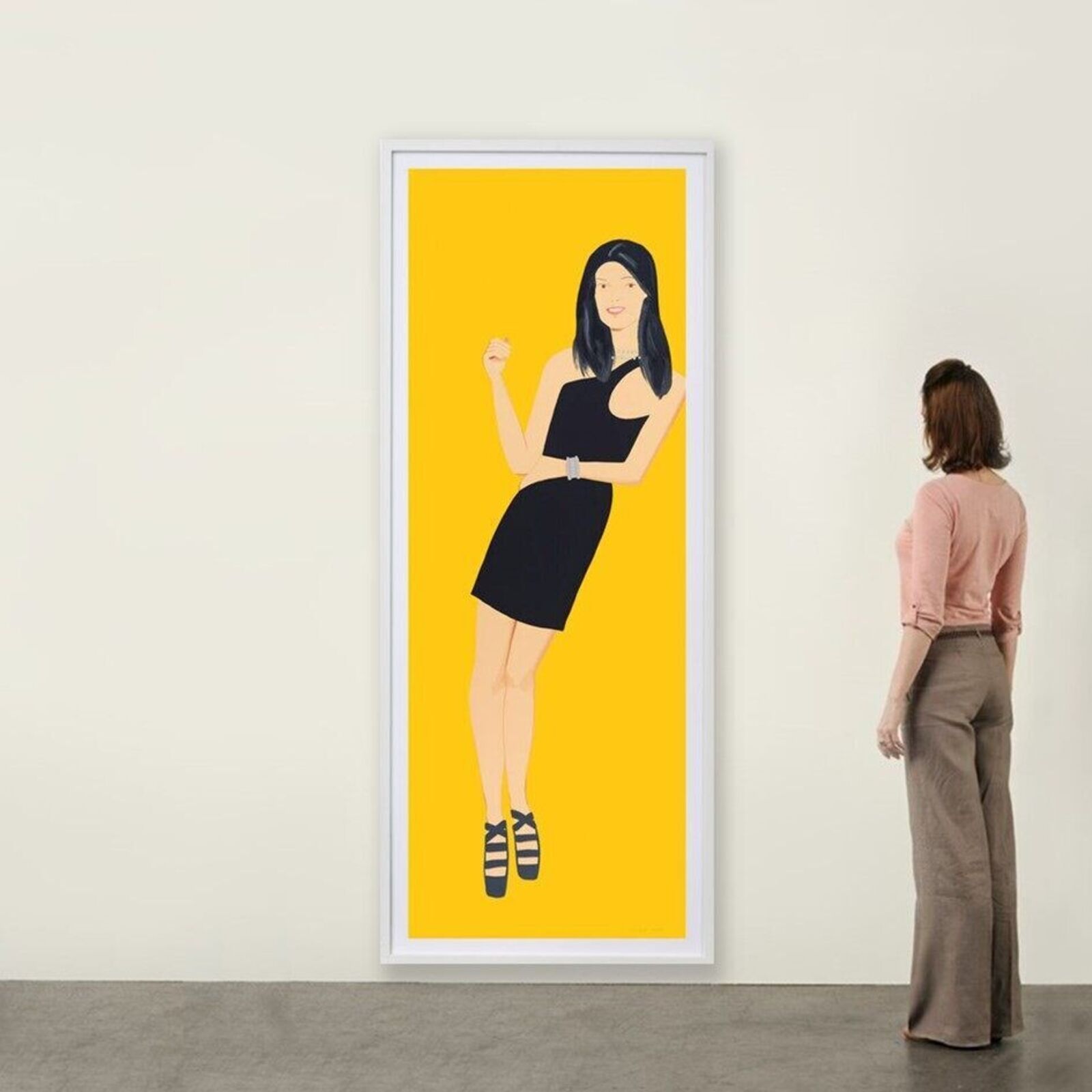 A series of nine framed portraits featuring figures in black dresses against a vibrant yellow background.