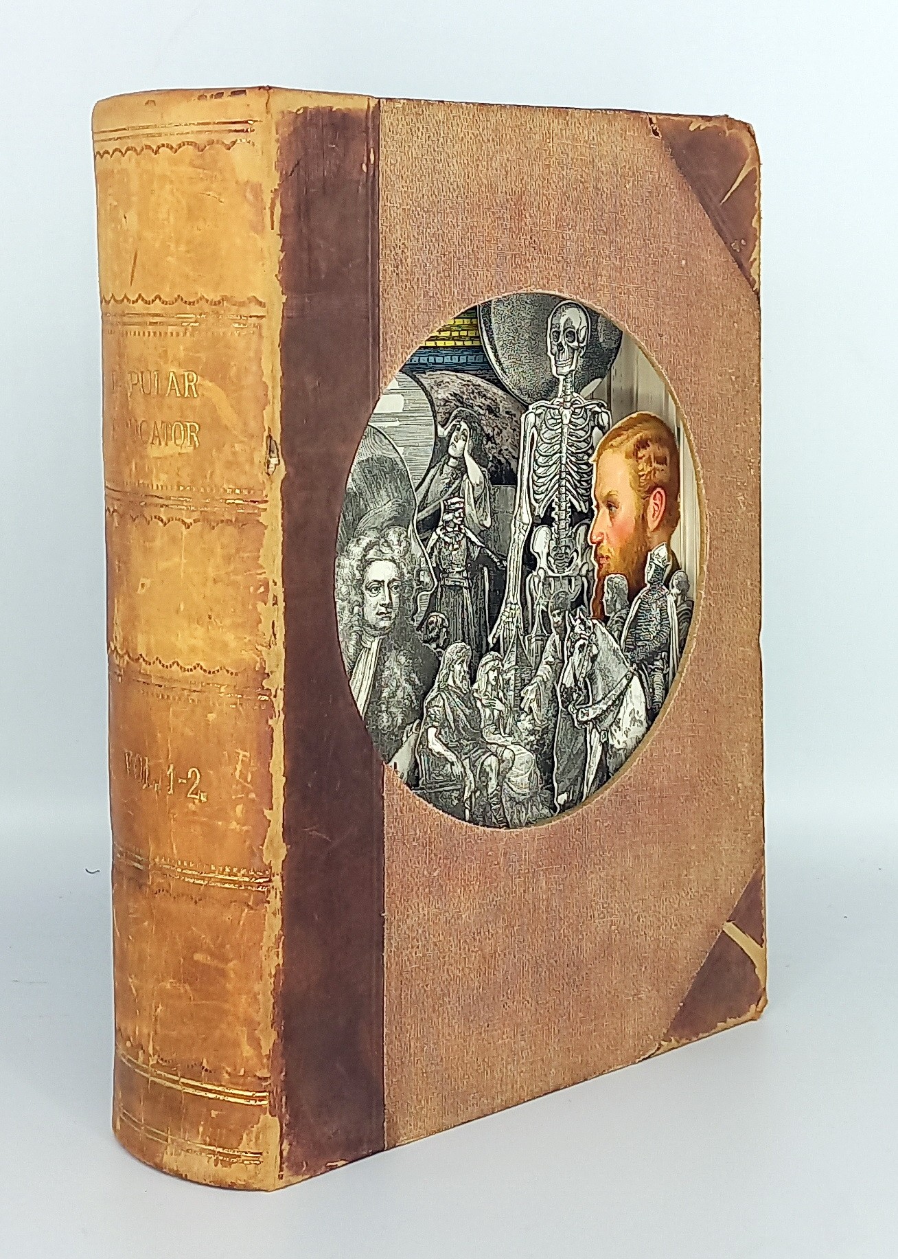 A picture of a book with a picture of people and a skeleton.