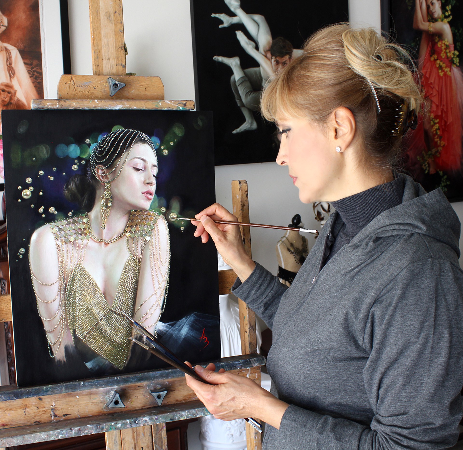 A painting of a woman in a gold dress.