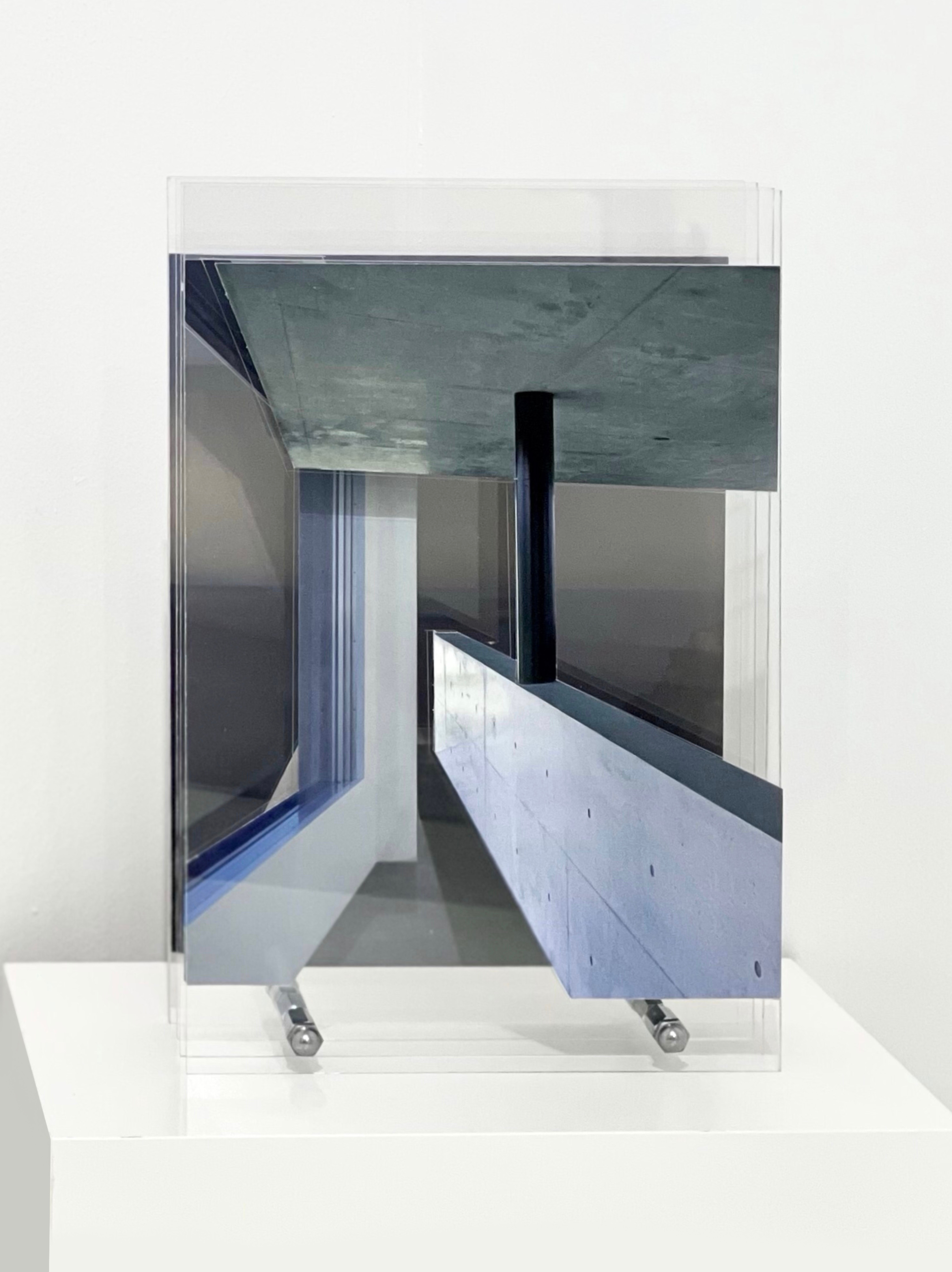 A picture of a mirror on a white table.