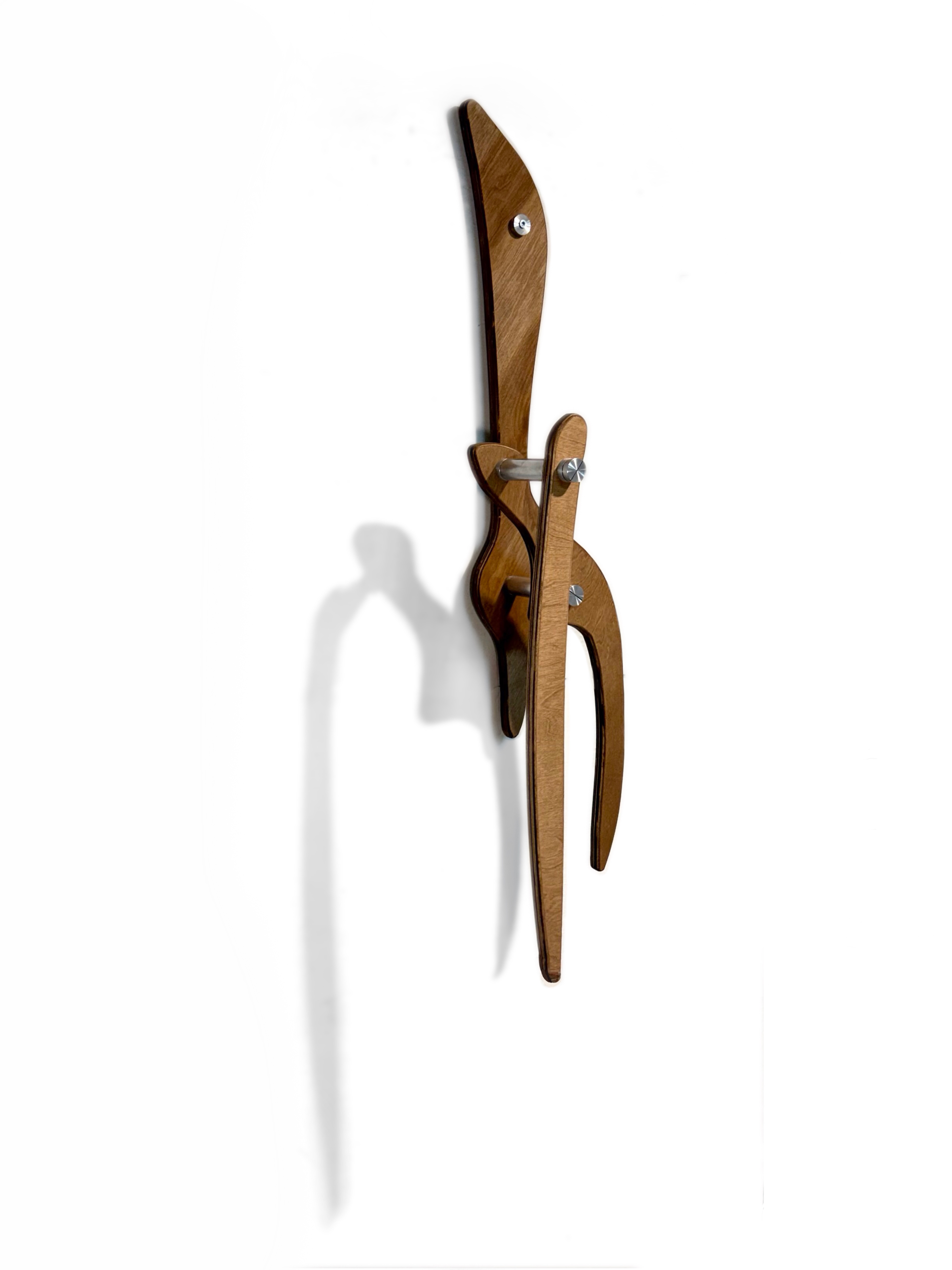 A pair of scissors sitting on top of a white surface.