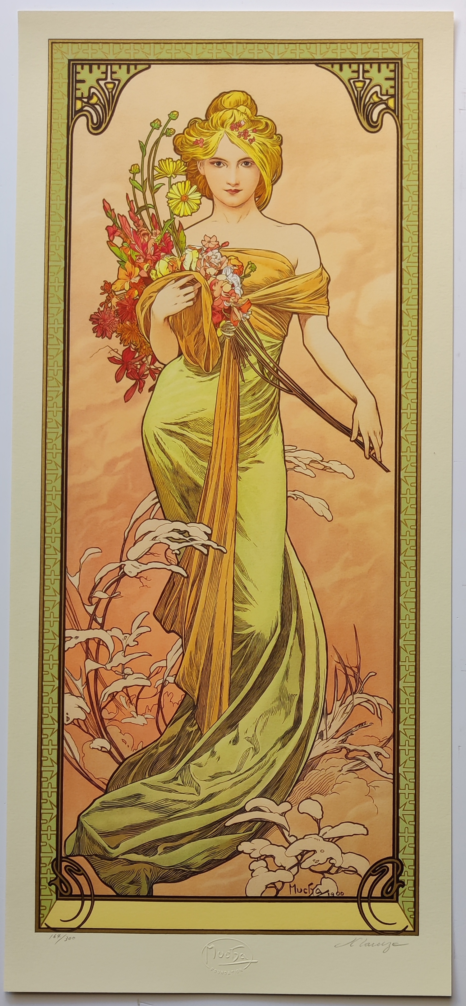 Four vertical panels depict stylized female figures in flowing gowns holding flowers, set against seasonal backdrops.