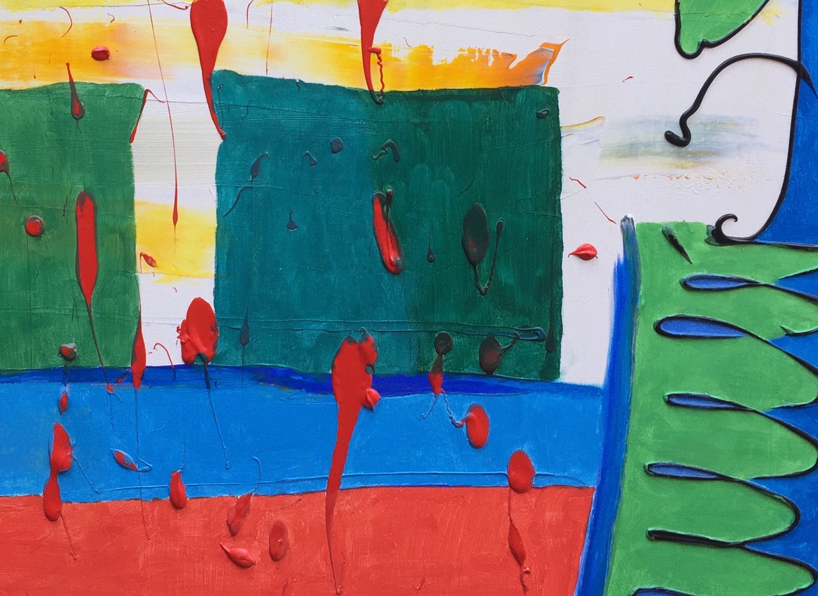 A painting with red, green, blue, yellow, and red paint splatters on it.