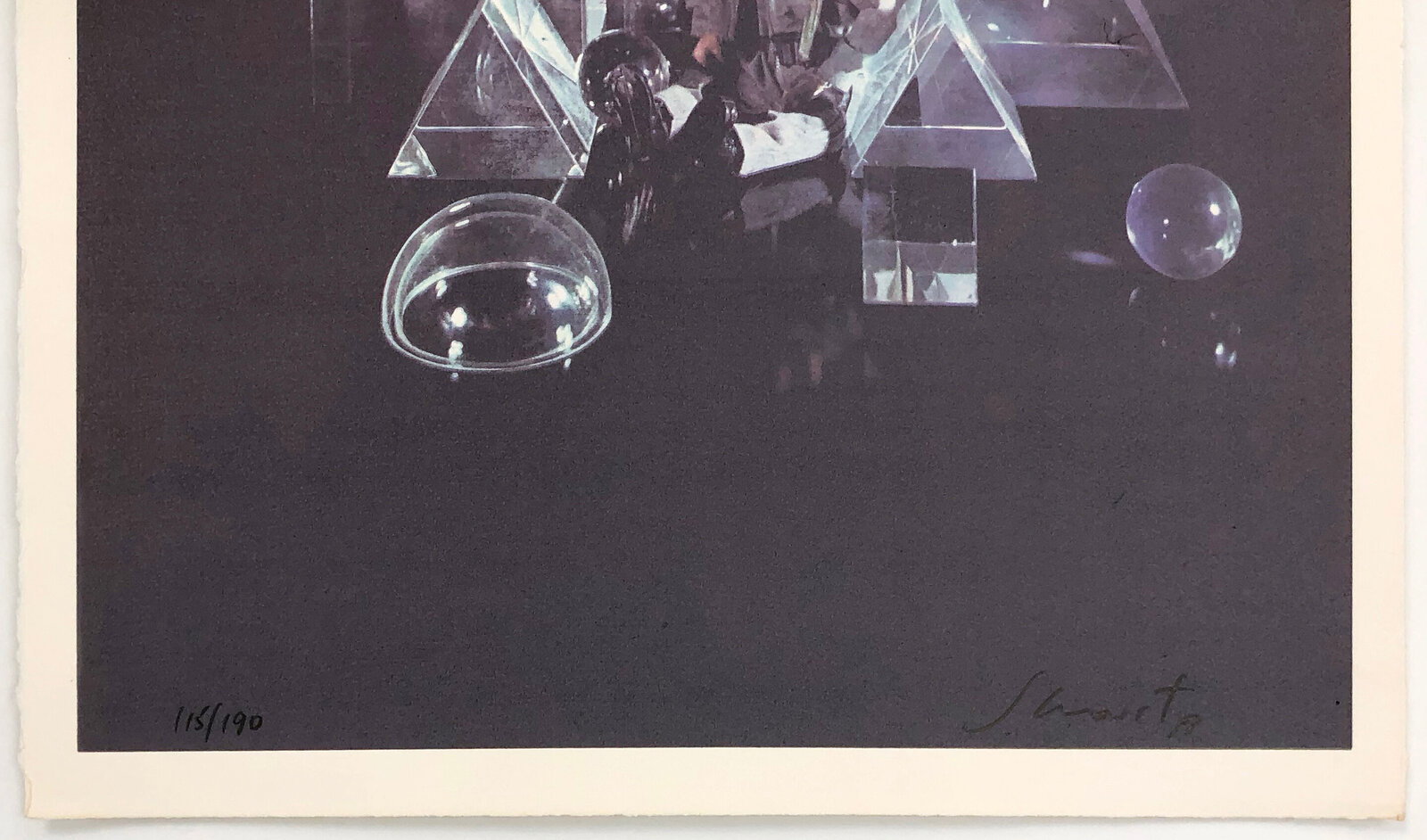 A surreal still life featuring a figure in a spacesuit surrounded by geometric glass objects.
