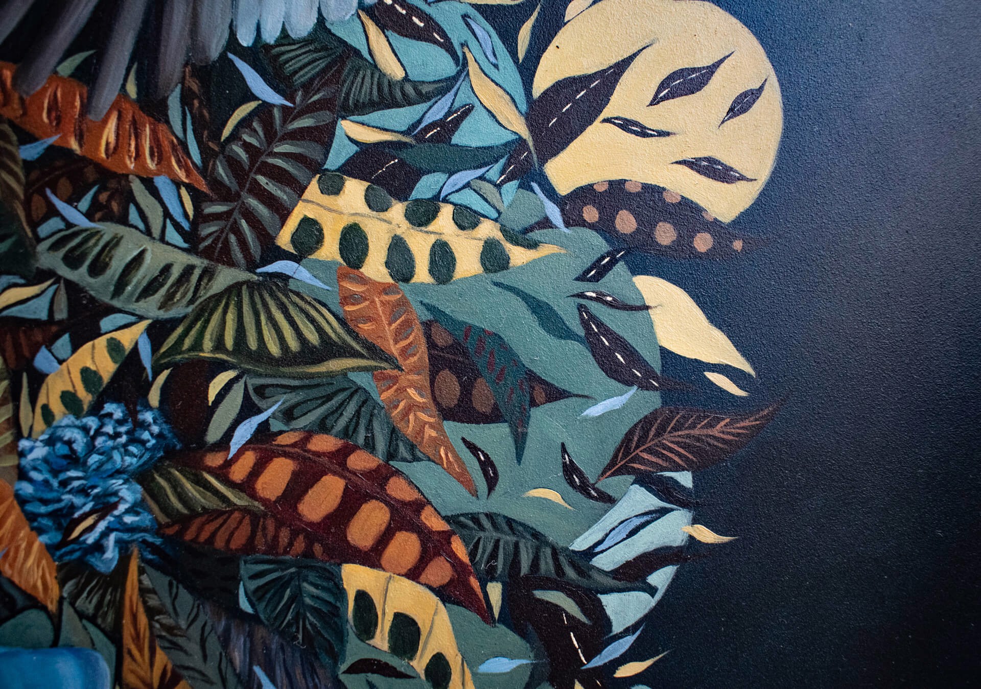 A painting of a hand holding a bunch of flowers and birds.