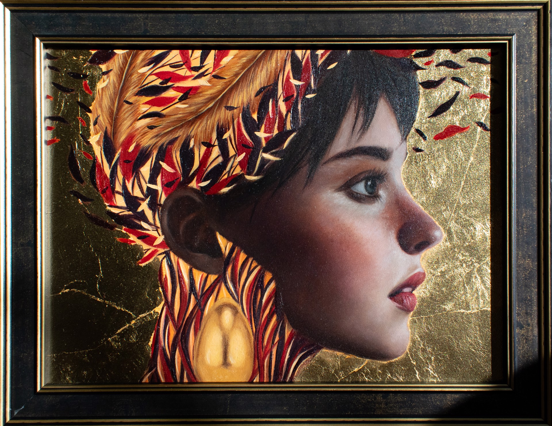 A painting of a woman with feathers on her head.