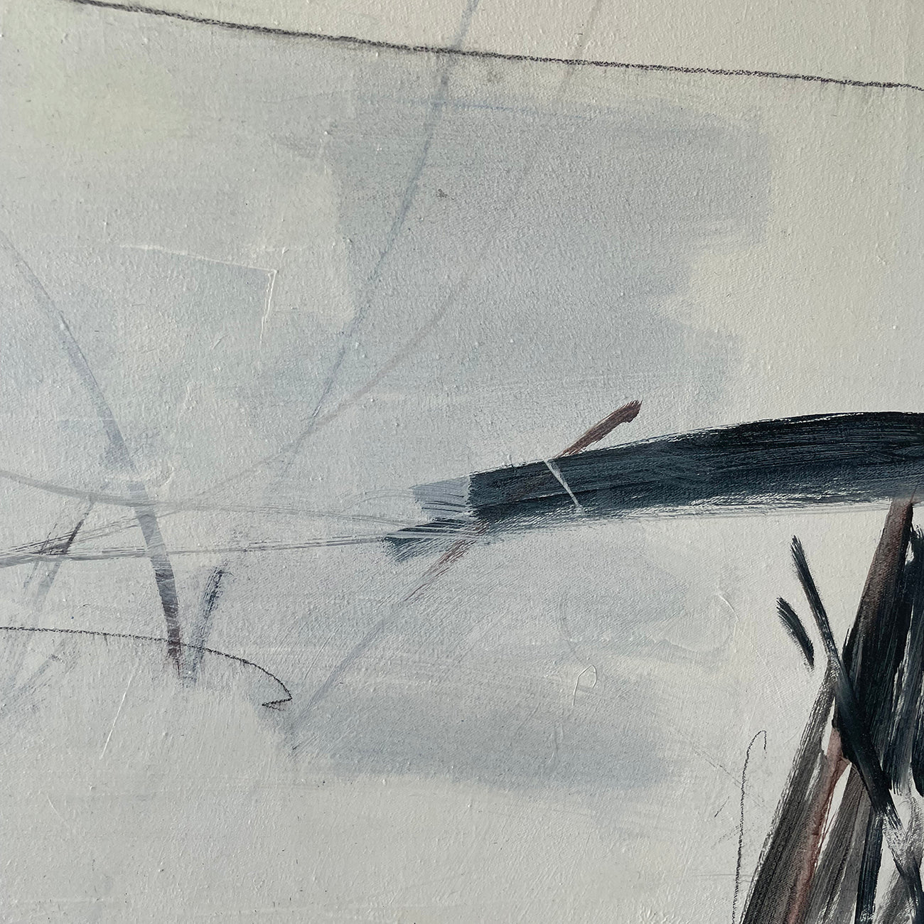 A painting with black and white paint on a white background.