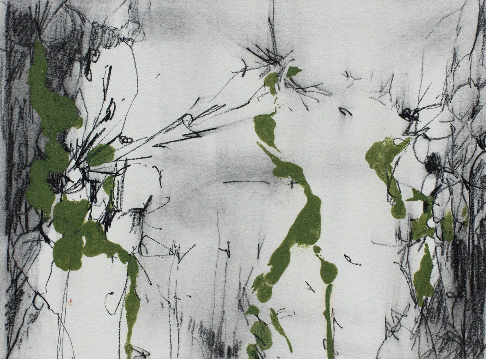 A black and white drawing with green paint splatters on it.