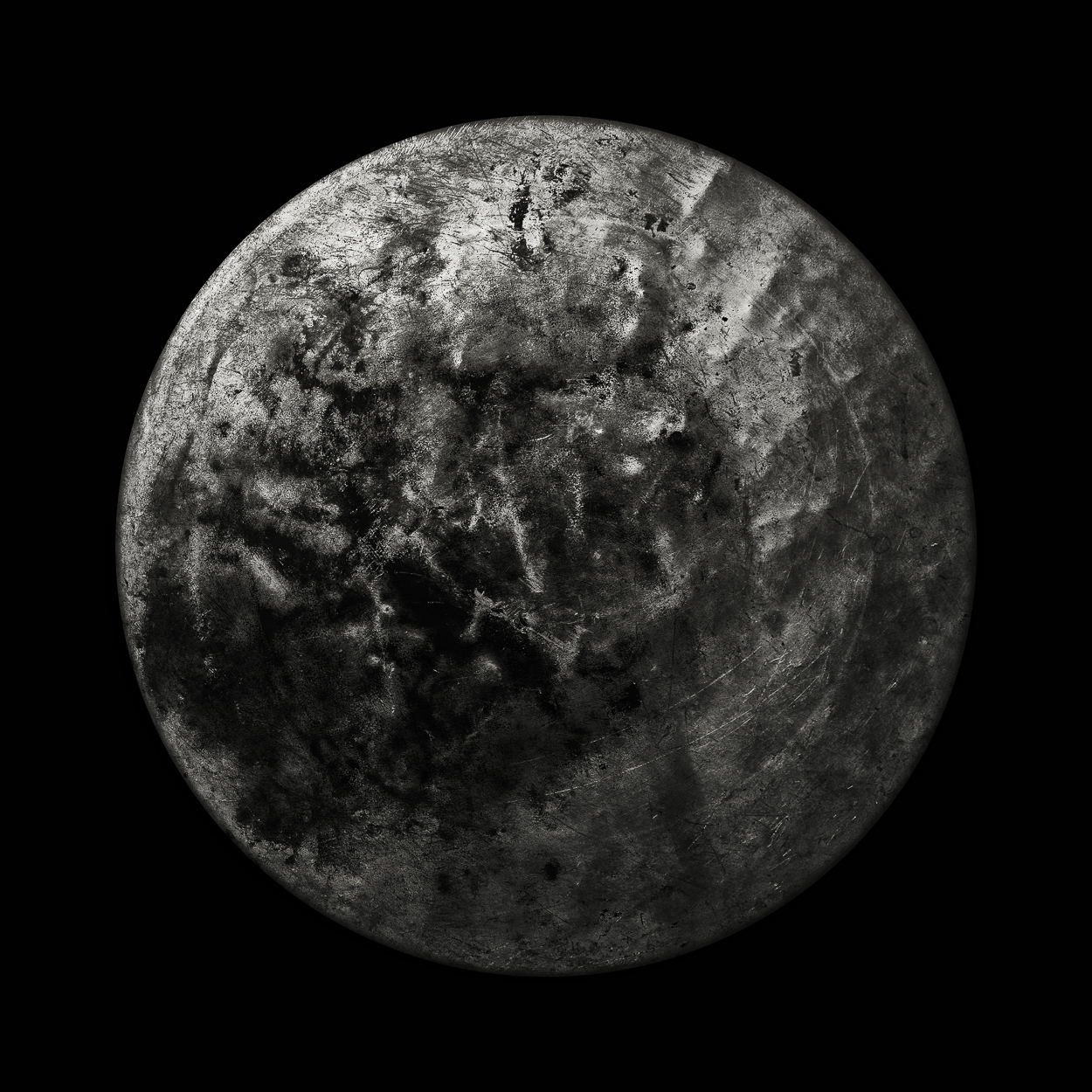 A black and white photo of the moon with a black background.