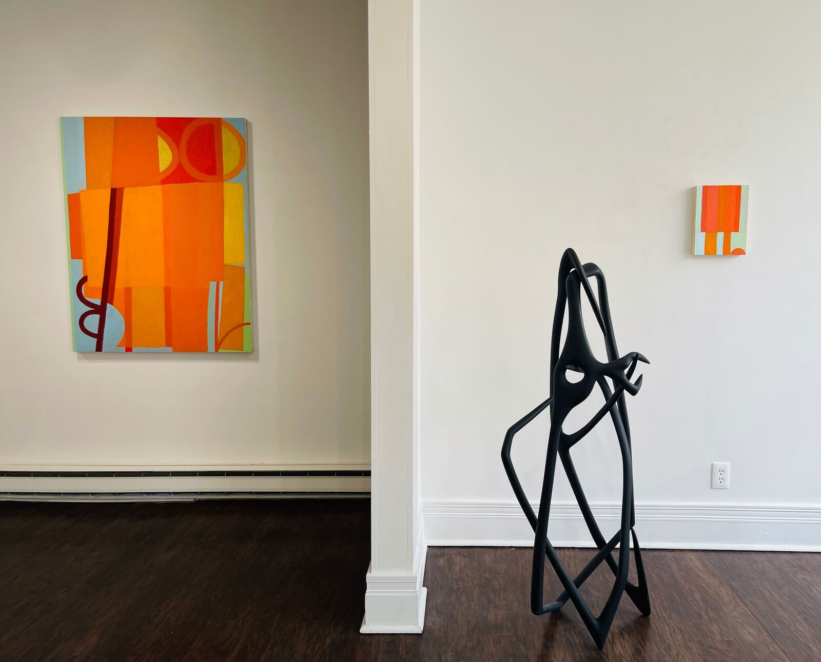 A geometric composition of vertical stripes in warm and cool tones.