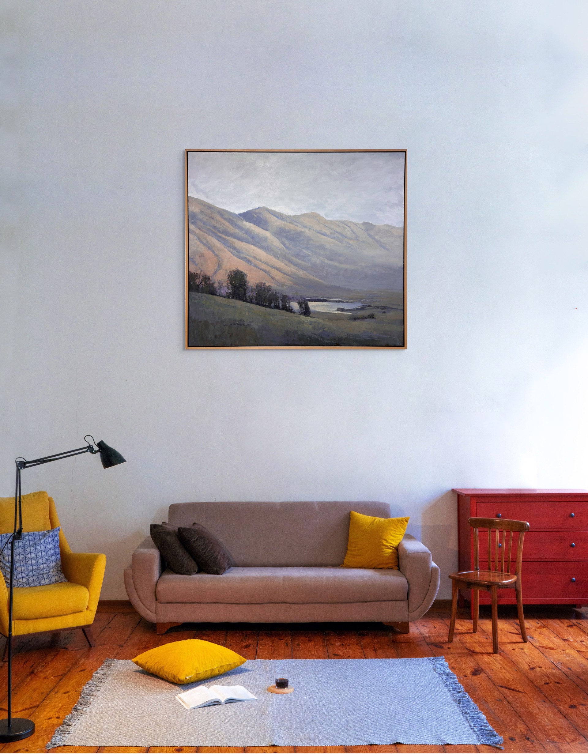 A painting of a landscape with mountains in the background.