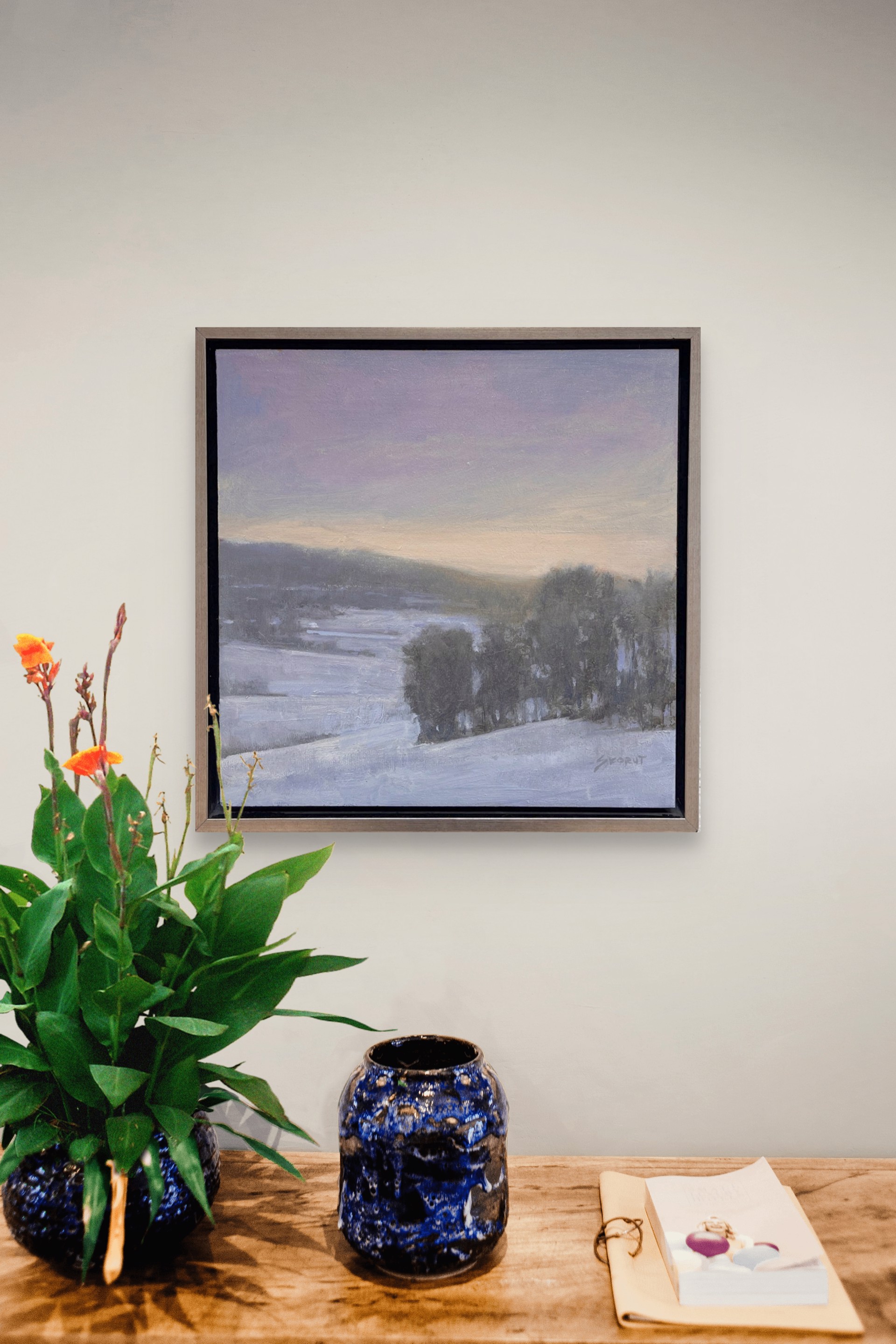 A painting of a snowy landscape with trees in the distance.