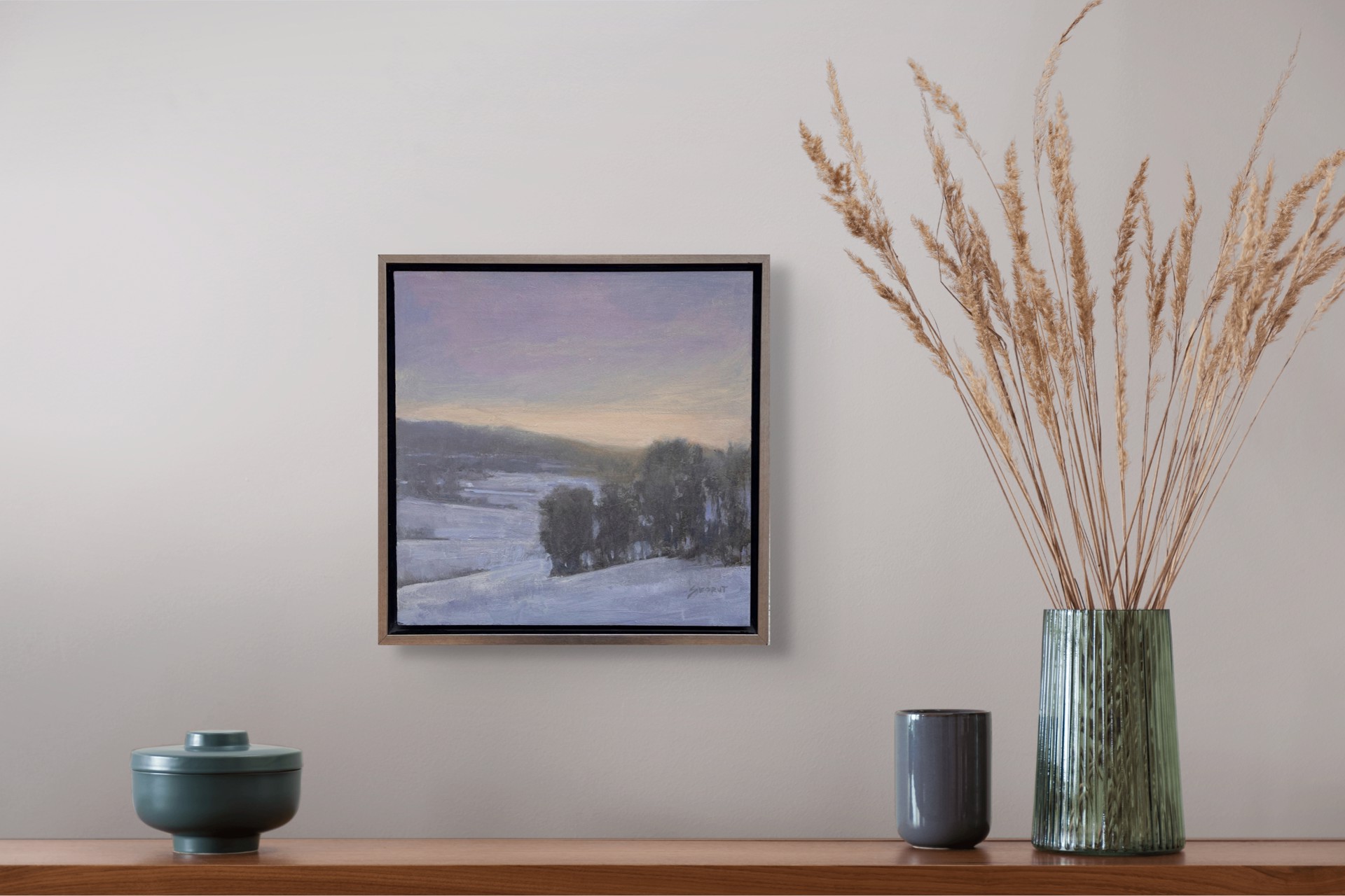 A painting of a snowy landscape with trees in the distance.