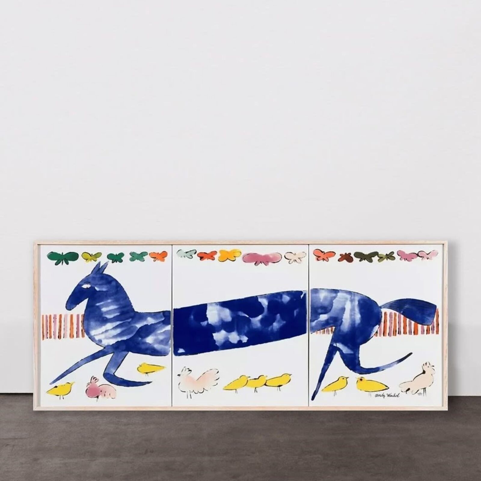 A painting of a horse and birds on a wall.