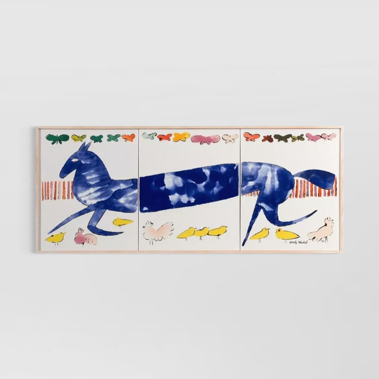 A painting of a horse and birds on a wall.