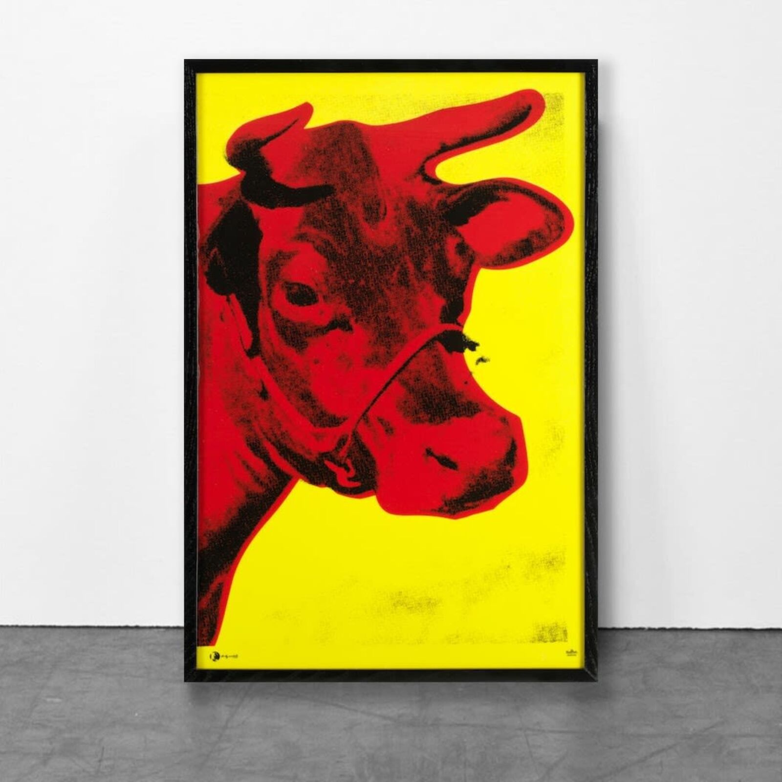 A picture of a red cow on a yellow background.