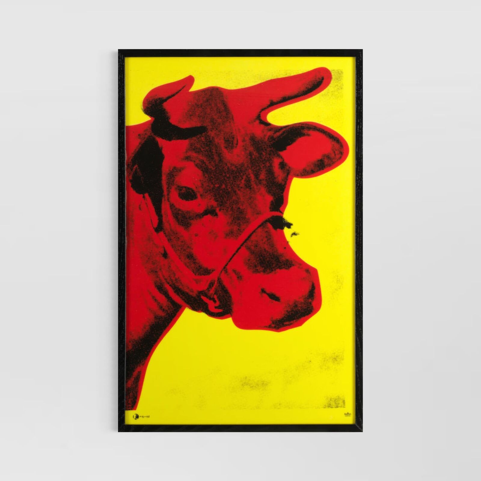 A picture of a red cow on a yellow background.