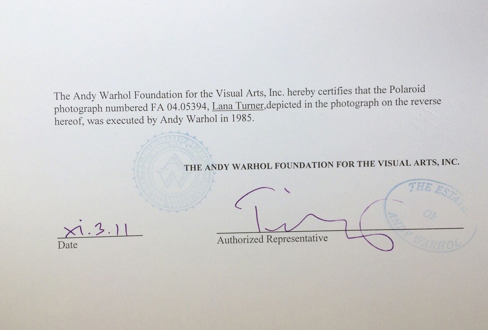 A polaroid photo of a woman with blonde hair.