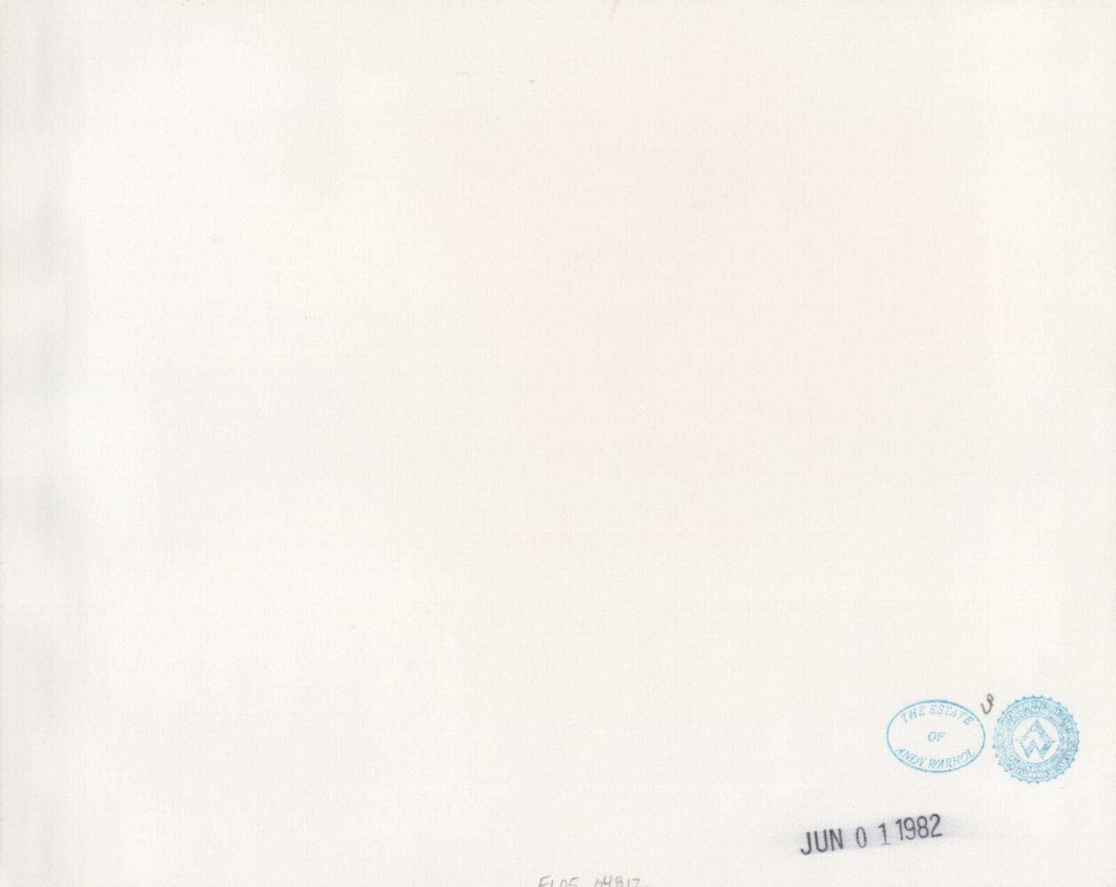 A black and white photo of a man standing in front of a building.